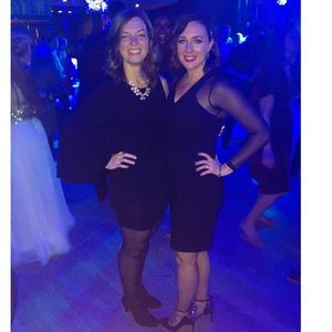 Calvin Klein black cocktail dress with sheer sleeves, size 4